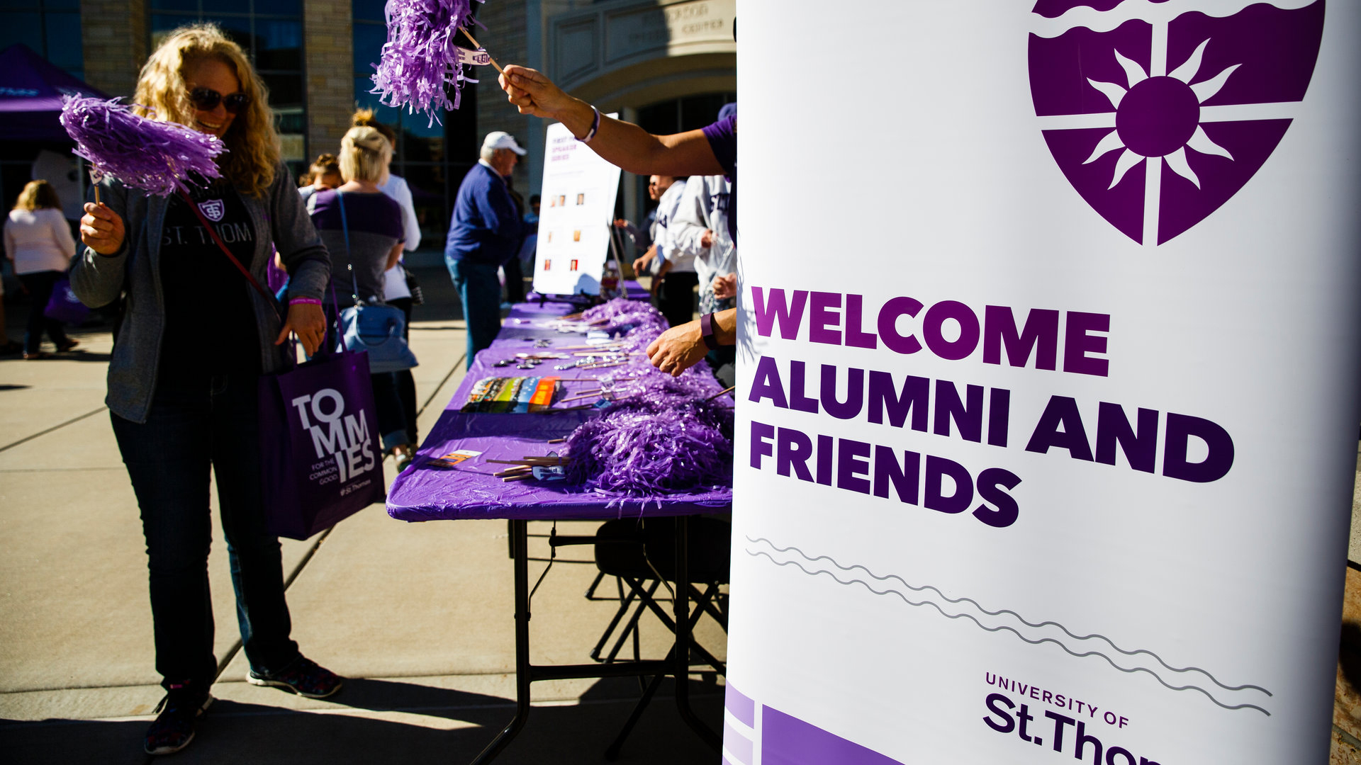 welcome alumni and friends sign on monahan plaza at homecoming